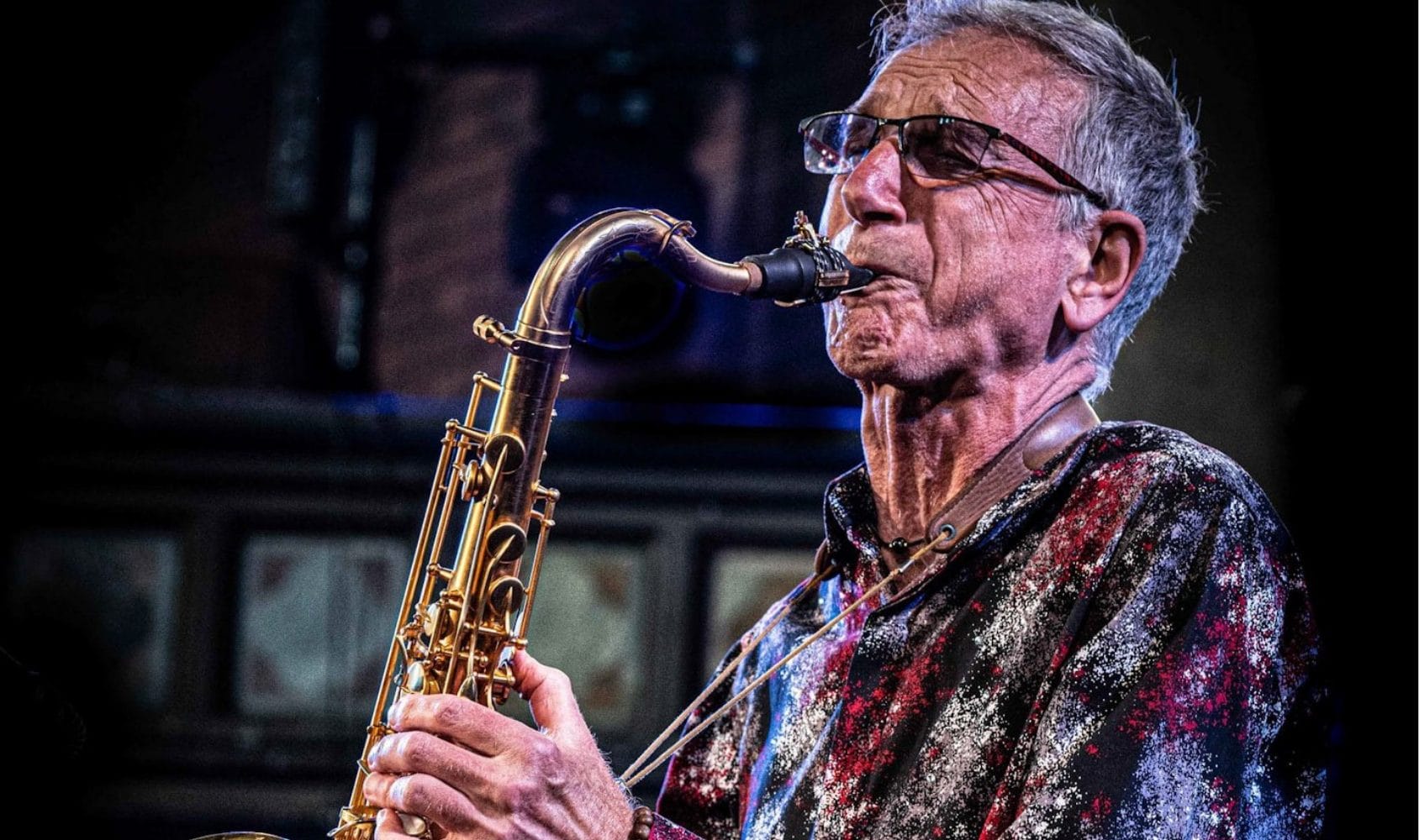 Photo of Snake Davis playing his saxophone.