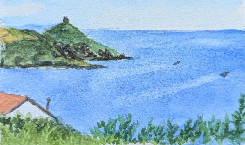 Close up photo of a watercolour seaside landscape.